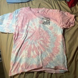 Pink white and blue trans rights shirt, It says XL but is a bit small